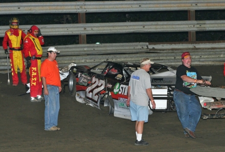 Charlie McKenna broke a wheel and hit the turn-three wall. (Barry Johnson)