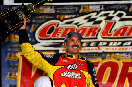 Tim Fuller celebrates at Cedar Lake in '09. (thesportswire.net)