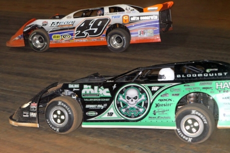 Jonathan Davenport (49) holds off a challenge from Scott Bloomquist (0) at Virginia Motor Speedway. (pbase.com/cyberslash)