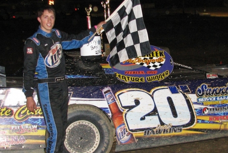 Jacob Hawkins picks up $1,500 at Brushcreek. (Larry Givens)