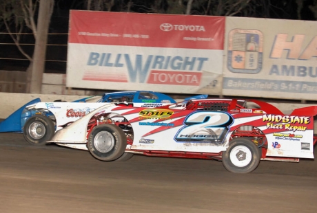 Bobby Hogge IV (2) makes the winning pass on Mike Johnson (7) at Bakersfield. (photofinishphotos.com)