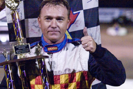 Lonnie Parker Jr. gives a thumbs up in victory lane. (rauhphoto.com)