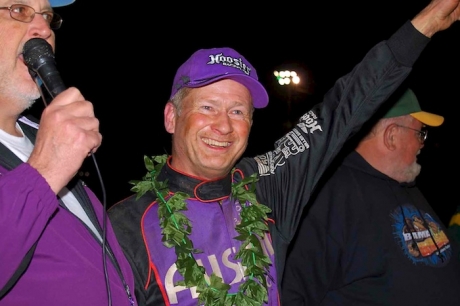 Ronnie Johnson waves to the Green Valley crowd between announcer Ross Tingle (left) and promoter Dennis Harker (right). (photobyconnie.com)