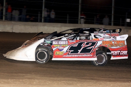 Brandon McCormick (42) battles runner-up Terry Phillips en route to victory. (Ron Mitchell)