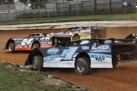 Rick Eckert (24) leads a heat race in a 2010 Speedweek event at Port Royal Speedway. (pbase.com/cyberslash)