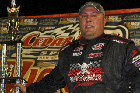 Scott James picks up his hardware Friday night at Cedar Lake. (Joshua Joiner)