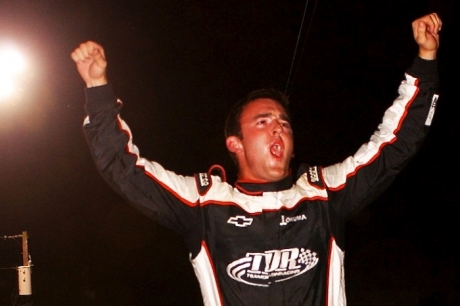 Austin Dillon climbs atop his car to celebrate. (rpmphotos.net)