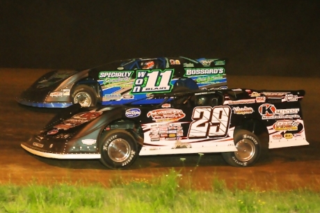 Darrell Lanigan (29) goes past Robbie Blair (11) en route to victory. (Joe Nowak)