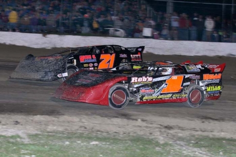 Winner Shane Williams (1) battles with Ivedent Lloyd Jr. (21). (Rick Anges)