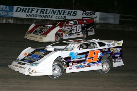 Denny Eckrich (50) passed Tim Isenberg (9) on the final lap. (mikerueferphotos.photoreflect.com)