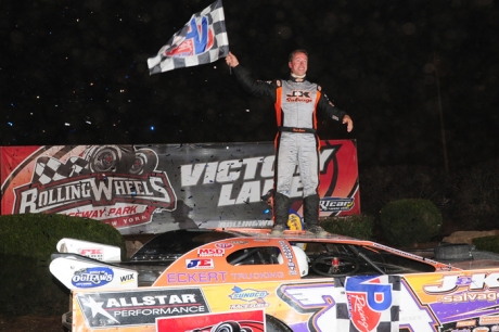 Rick Eckert celebrates at Rolling Wheels Raceway Park. (Bobby Armbruster)