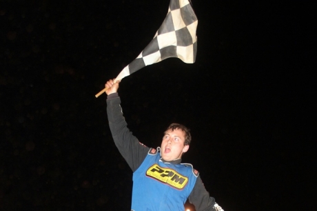 Chris Wilson celebrates his $4,000 victory. (Chad Wells)