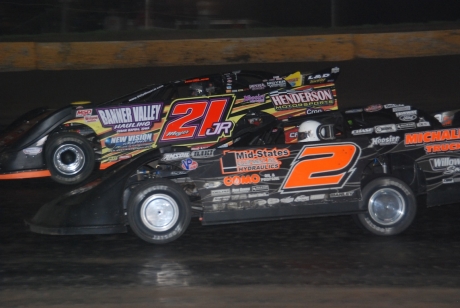 Billy Moyer Jr. (21jr) fights off Brady Smith (2) in turn two at Cedar Lake. (DirtonDirt.com)