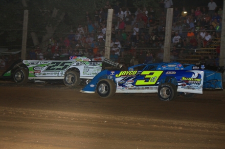 Jason Feger (25) held off Brian Shirley (3) at Lincoln Park. (Jeremey Rhoades)