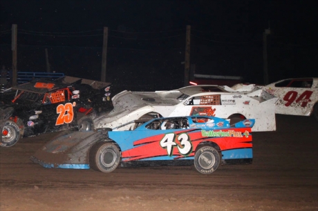 Garrett Alberson (43) tries to avoid this scramble in Las Cruces. (jimrosasphotography.com)