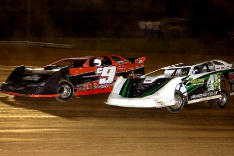 Steve Casebolt (9) turns back a challenge from Jackie Boggs in the third heat race. (Roy Walker)