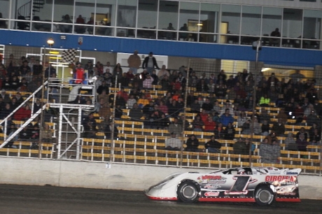 Will Vaught crosses the finish line for a $5,000 victory at Lakeside. (fasttrackphotos.net)