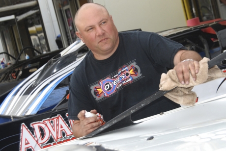 Scott James cleans up the Warrior house car during Florida Speedweeks. (DirtonDirt.com)