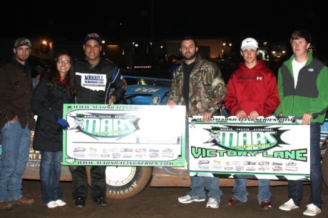 Raymond Merrill and his crew enjoy victory lane. (Ron Mitchell)