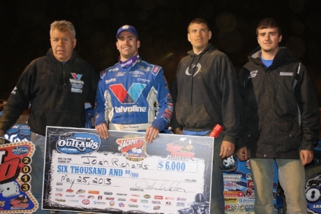 The Rocket Chassis house car team enjoys victory lane. (Kevin Kovac)