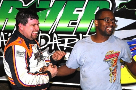 Riley Hickman celebrates in victory lane with crew chief Brad Carvin. (photobyconnie.com)