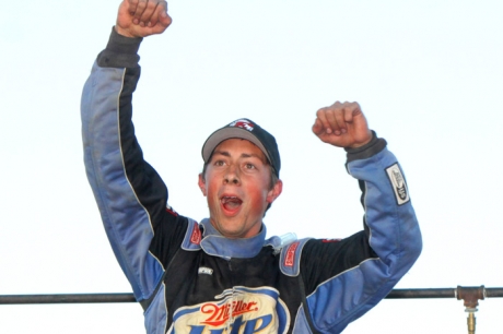 Jacob Hawkins celebrates his $2,000 victory. (Jeremey Rhoades)