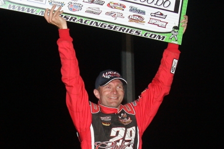 Tony Jackson Jr. celebrates his $3,000 victory at McCool Junction. (Ron Mitchell)