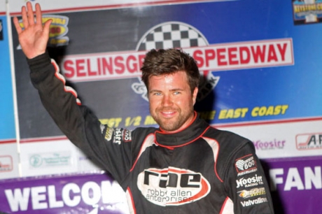 Gregg Satterlee waves in victory lane. (pbase.com/cyberslash)