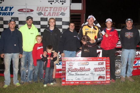 Chad Simpson enjoys victory lane at Farley. (Dan Busch)