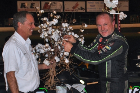 Jimmy Owens picks the cotton in victory lane. (DirtonDirt.com)