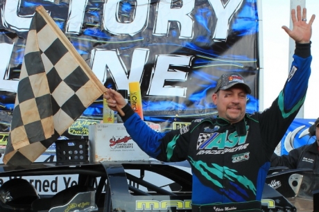 Chris Madden waves to the crowd at Cherokee. (Howard Lawson)