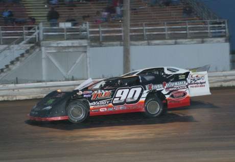 Lance Matthees (90) overtakes Steve Laursen. (Ken Johnson)