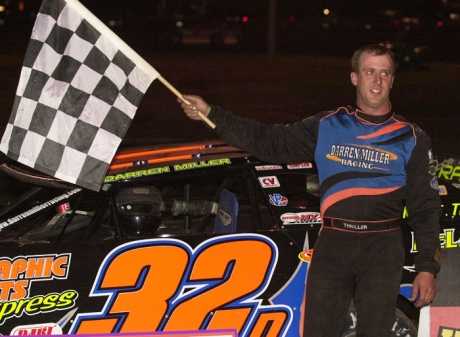 Darren Miller celebrates at Farmer City. (Shawn Crose)