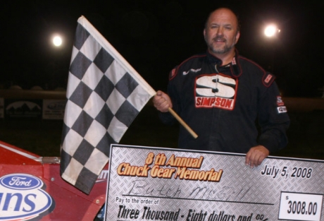 Butch McGill enjoys victory lane. (Bob Reed)