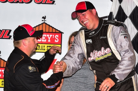 Mike Marlar (left) congratulates Chad Simpson at Knoxville. (heathlawsonphotos.com)