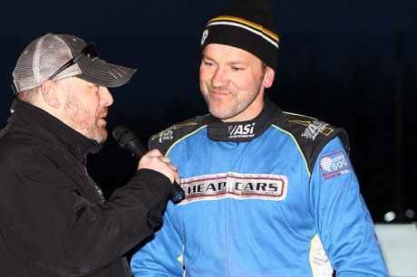 Mike Norris interviews Iowa driver Brian Birkhofer. (mikerueferphotos.photoreflect.com)