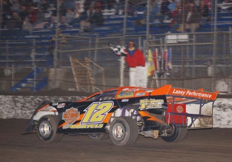 Ron Bartels takes the checkered flag. (K.C. Rooney)