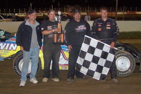 Chinn and teammates enjoy victory lane. (Dustin Jarrett)