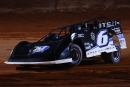 Brian Shirley avoided injury when his car&#039;s engine erupted in flames during Jan. 28 Hunt the Front Super Dirt Series heat action at Needmore Speedway. (joshjamesartwork.com)