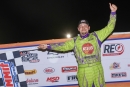 Tyler Erb of New Waverly, Texas, celebrates Wednesday's flag-to-flag victory in the DIRTcar Summer Nationals season opener at Peoria (Ill.) Speedway. (brendonbauman.com)