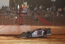 Hudson O'Neal takes the checkers June 16 for his $15,000 Sidney Langston Memorial Super Late Model victory at Ultimate Motorsports Park in Elkin, N.C. (Kevin Ritchie)