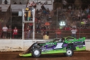 Tyler Erb of New Waverly, Texas, takes the checkers after repelling Jason Feger to grab his seventh DIRTcar Summer Nationals victory of the season at Red Hill Raceway in Sumner, Ill. (Tyler Carr)