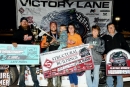 Cole Searing&#039;s team celebrates his Aug. 9 Structural Buildings WISSOTA Challenge Series victory at Gondik Law Speedway in Superior, Wis. (shooterguyphotos.com)