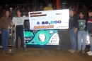 Scott Bloomquist of Mooresburg, Tenn., celebrates a $25,000 victory after leading all 100 laps of the Jambalaya 100 at Pike County Speedway in Meridian, Miss., on Nov. 4, 2006. (Todd Turner)