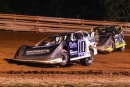 Winner Taylor Scheffler (10s) and Nick Anvelink (15) battle for the lead in Sept. 13&#039;s Wabam Dirt Kings Tour event at Langlade County Speedway in Antigo, Wis. (Chad Marquardt)