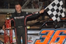 Mike Marlar of Winfield, Tenn., led the final 84 laps, most of them with extensive right-rear damage, to win the $25,010 21st annual Magnolia State 100 at Magnolia Motor Speedway in Columbus, Miss. (Todd Turner)