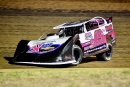 Ryan Gustin of Marshalltown, Iowa, primarily ran the cushion to win Thursday&#039;s $5,000 Lucas Oil Midwest LateModel Racing Association Fall Nationals opener at Lucas Oil Speedway. (photosbyboyd.smugmug.com)