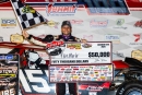 Mike Marlar displays his $50,000 check for winning Oct. 12&#039;s Lucas Oil Series-sanctioned Jackson 100 at Brownstown (Ind.) Speedway. (heathlawsonphotos.com)