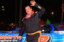 Michael Rouse waves to the crowd after winning Oct. 12's 50-lap Steel Block Bandits feature at County Line Raceway in Elm City, N.C. (Zack Kloosterman)