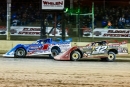 Bobby Pierce (32) of Oakwood, Ill., begins to make his move by Tim McCreadie (1) before leading the final 17 laps, winning the $100,000 44th annual Dirt Track World Championship at Eldora Speedway. (heathlawsonphotos.com)